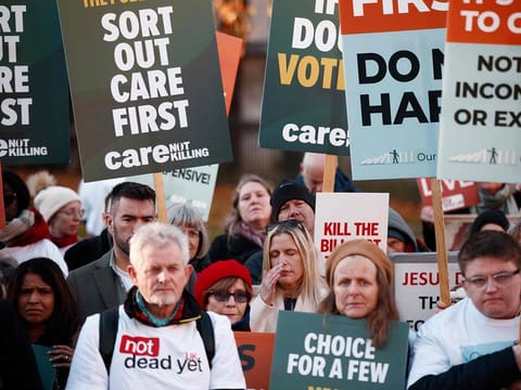 Campaigners against the assisted suicide bill react after the bill to legalise euthanasia in the UK is passed, outside The Palace of Westminster in central London, on November 29, 2024.