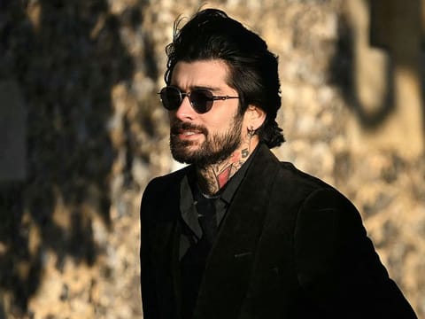 Former One Direction band member Zayn Malik leaves after attending the funeral service of the late One Direction singer Liam Payne, at a St Mary's church in Amersham, west of London on November 20, 2024.