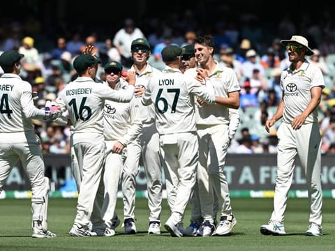 Australia's captain Pat Cummins (2nd from right) celebrates his dismissal of India's Nitish Kumar Reddy with teammates on the third day of the second Test cricket match at the Adelaide Oval on Sunday.