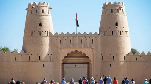 The fort's entrance is flanked by two large round towers