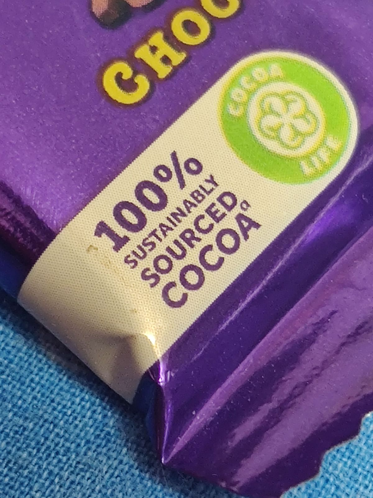 Cadbury Dairy Milk wrapper bears '100% sustainably sourced cocoa' tag