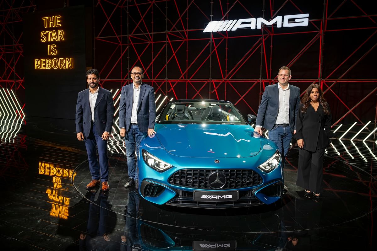 Santosh Iyer, MD & CEO and Lance Bennett launching the new AMG SL 55 4MATIC+ roadster version with Bollywood Actor Farhan Akhtar and Director Zoya Akhtar.