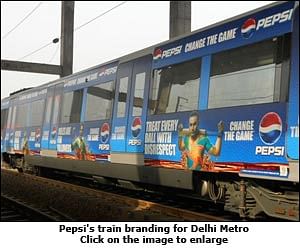 Mudra Max wraps Delhi Metro trains with Pepsi packaging