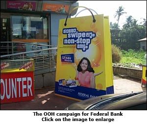 Federal Bank creates giant shopping bags to promote debit card loyalty programme