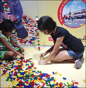 Build, don't break, urges Lego