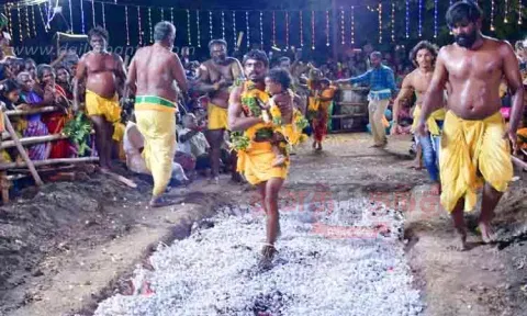 பூக்குழி இறங்கிய பக்தர்