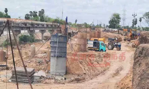 காவனூரில் உயர்மட்ட பாலம் அமைக்கும் பணி தீவிரம்
