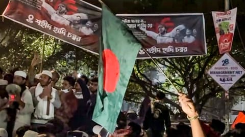  People stage a protest over the death of Sharif Osman Hadi, one of the key leaders in the Bangladesh student uprising, in Dhaka, Bangladesh