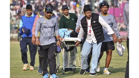 Mumbai's Angkrish Raghuvanshi being taken off field on a stretcher after an injury during a Vijay Hazare Trophy 2025-26 cricket match between Mumbai and Uttarakhand, at Sawai Mansingh Stadium, in Jaipur, Rajasthan. (Photo: PTI)