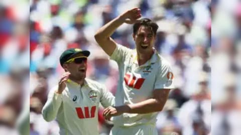 Australia's Pat Cummins celebrates with teammates