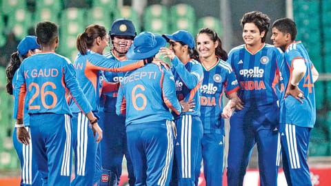 India players celebrate the wicket of Hasini Perera