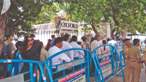 Aspirants waiting outside the US Consulate in Chennai