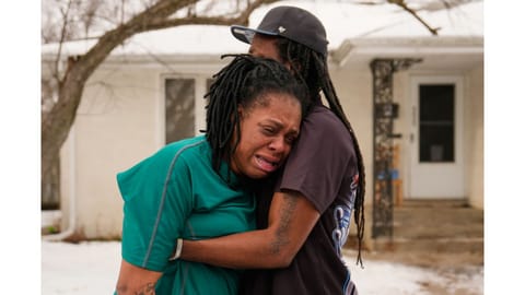 A family member reacts after federal immigration officers make an arrest in Minneapolis.
