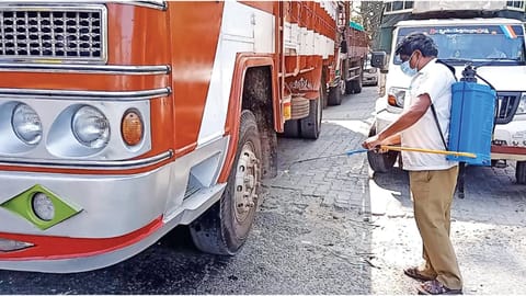 Vehicles are disinfected at border checkpoints to stop the spread of zoonotic diseases 