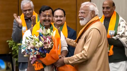 Prime Minister Narendra Modi felicitates newly elected BJP National President Nitin Nabin after the latter assumed charge, at party headquarters, in New Delhi. Defence Minister Rajnath Singh, Union Minister JP Nadda and BJP National General Secretary (Org) B.L. Santhosh are also seen. 