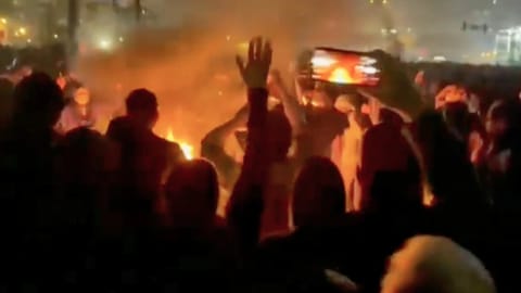 Iran shows protesters taking to the streets despite an intensifying crackdown as the Islamic Republic remains cut off from the rest of the world in Tehran, Iran
