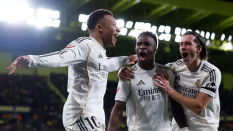 Kylian Mbappe celebrating with his team mates