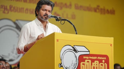 Vijay addressing a massive gathering of party workers 