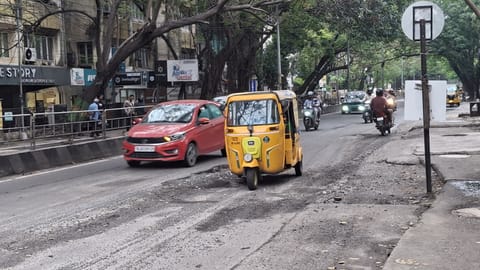 Motorists find it difficult to negotiate the dangerous state of Sterling Road