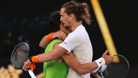 Carlos Alcaraz of Spain is congratulated by Alexander Zverev, right, of Germany following their semifinal match at the Australian Open tennis championship in Melbourne in Australia.
