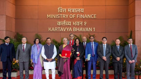 Finance Minister Nirmala Sitharaman with Minister of State for Finance Pankaj Chaudhary and her team members outside the Ministry of Finance before the presentation of the Union Budget 2026-27, in New Delhi on Sunday (February 1).