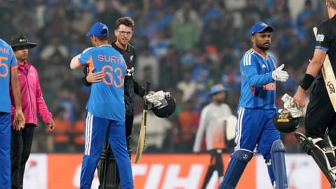 Mitchell Santner with Surya Kumar Yadav 