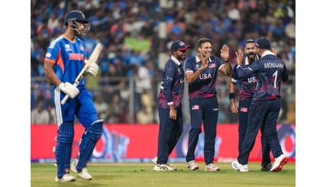USA's players celebrate the dismissal of India's Shivam Dube during the ICC Men's T20 World Cup 2026 cricket match between India and USA, at the Wankhede Stadium, in Mumbai, Saturday, Feb. 7, 2026 