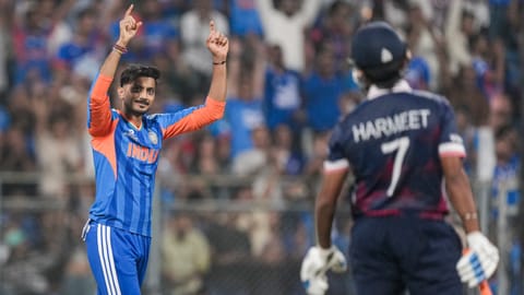 India's Axar Patel celebrates after taking the wicket of USA's Harmeet Singh during the ICC Men's T20 World Cup 2026 cricket match between India and USA, at the Wankhede Stadium, in Mumbai, Saturday, Feb. 7, 2026  
