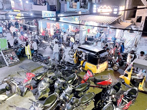 Crowds throng 24/7 fast-food joints on Decoster Road in Pulianthope, resulting in traffic congestion