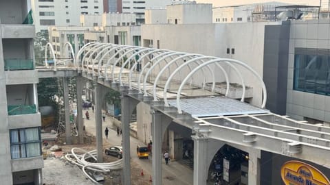 Foot-over-bridge (FoB) skywalk connecting Poonamallee-Vadapalani metro line travelling passengers.