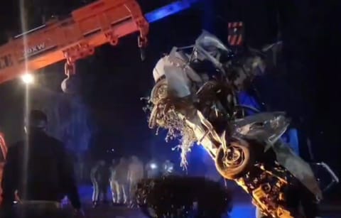 Wreckage of a car being removed from the road after its collision with a truck, in Dausa district, Rajasthan, Tuesday night, Feb. 10, 2026. At least six people were killed in the accident.