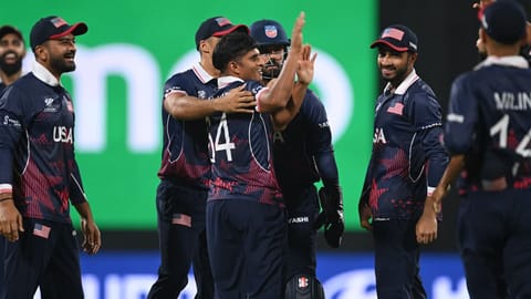 US's Nosthush Kenjige celebrating after the dismissal of Netherlands Michael Levitt