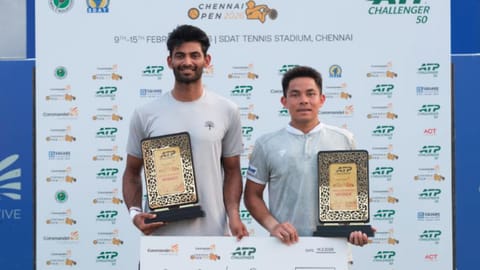 Doubles champions Pruchya Isaro and Niki Kaliyanda Poonacha