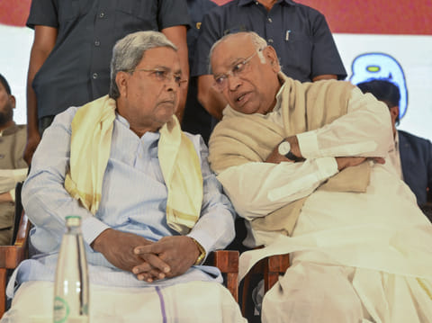  Leader of Opposition in Rajya Sabha and Congress President Mallikarjun Kharge and Karnataka Chief Minister Siddaramaiah during a memorial speech programme of late Karnataka minister Bheemanna Khandre, in Bengaluru.
