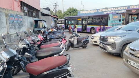 Buses navigate through the Nandivaram-Guduvancheri bus terminus as vehicles take over space 