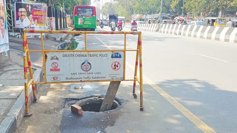 Barricaded storm water drain on the main road