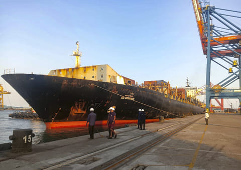 Dockworkers prepare to berth a container-laden vessel at VO Chidambaranar Port (VOC Port), in Tuticorin, Tamil Nadu. 