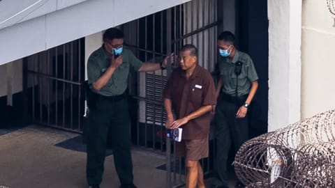 Jimmy Lai walks through the Stanley prison, in Hong Kong, July 28, 2023