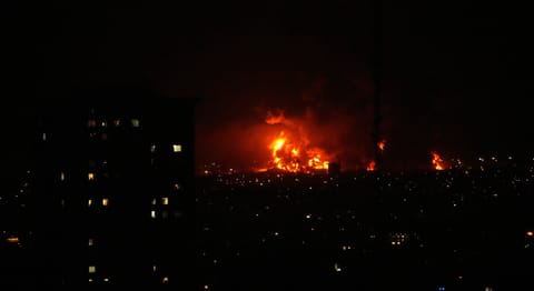 Flames rise from an oil storage facility south of the capital Tehran as strikes hit the city during the US–Israel military campaign, Iran