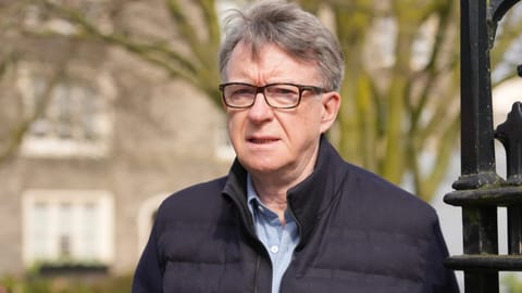 Peter Mandelson, the former UK ambassador to the United States, leaves his house in London