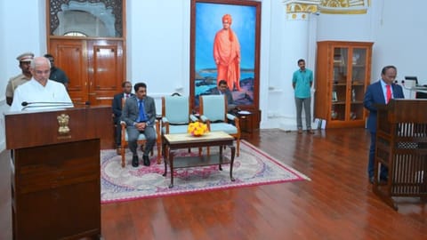 Governor Rajendra Vishwanath Arlekar administering the oath to State Information Commissioner A Vijayaram at Lok Bhavan on Friday 