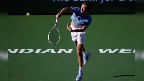 Daniil Medvedev, of Russia, serves against Carlos Alcaraz, of Spain, during a semifinal match at the BNP Paribas Open tennis tournament,
in Indian Wells, Calif.