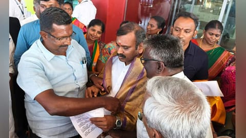 Union Minister of State L Murugan at the Thoothukudi Airport on Saturday