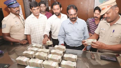 Cash seized during vehicle checks handed over to election authorities in Tirupur 