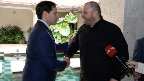 Secretary of State Marco Rubio, left, and Secretary of the National Security of Ukraine Rustem Umerov shake hands