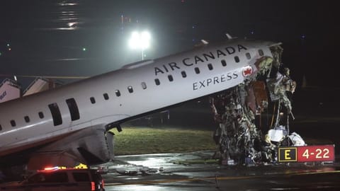 Air Canada flight hits fire truck at New York's LaGuardia