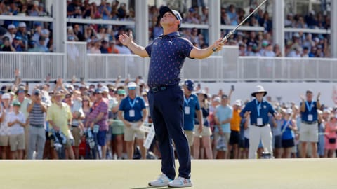 Gary Woodland celebrates after sinking his final putt on the 18th green to win the Texas Children's Houston Open golf tournament 
in Houston.