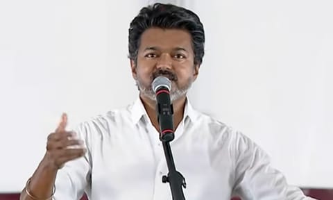 Actor and TVK founder Vijay addressing a campaign rally
