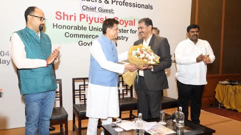 Union Minister Piyush Goyal being greeted at the interactive session of industrial bodies in Coimbatore on Friday