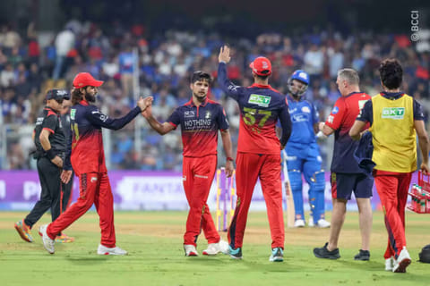 RCB players celebrating after defeating Mumbai Indians on Sunday in Mumbai.

